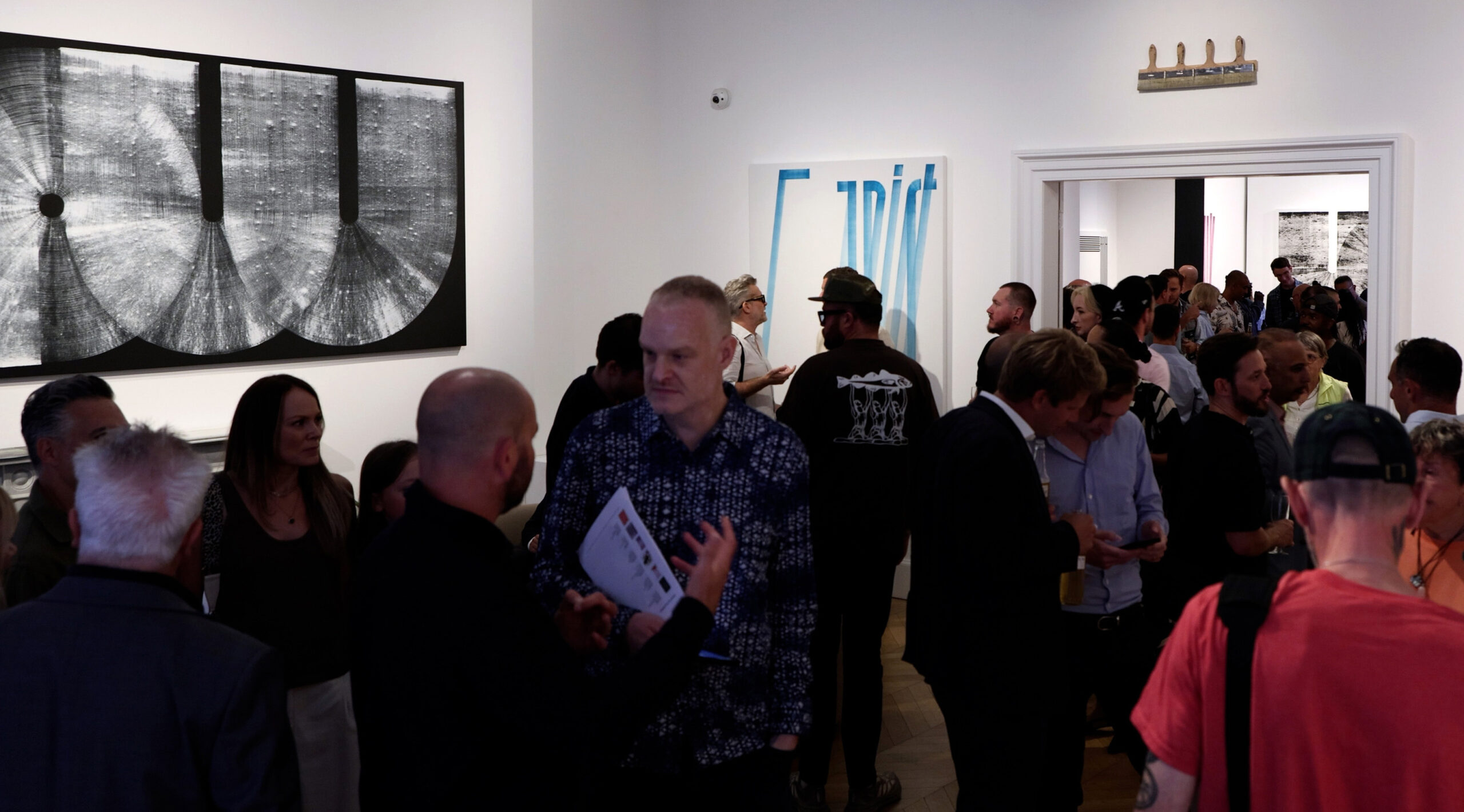 The room, full, at the private view of 'Growth'